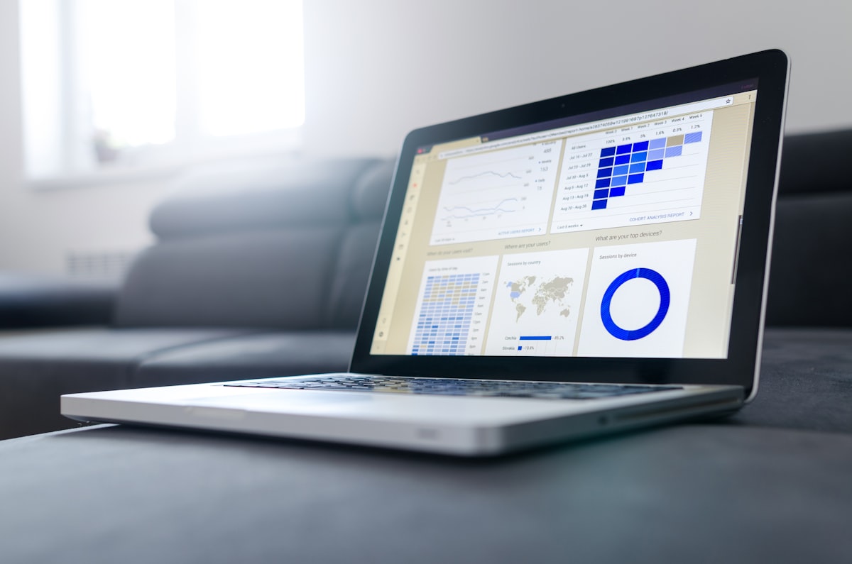 Multiple monitoring screens displaying data dashboards and analytics in a control room, representing the observability infrastructure needed for AI agent governance