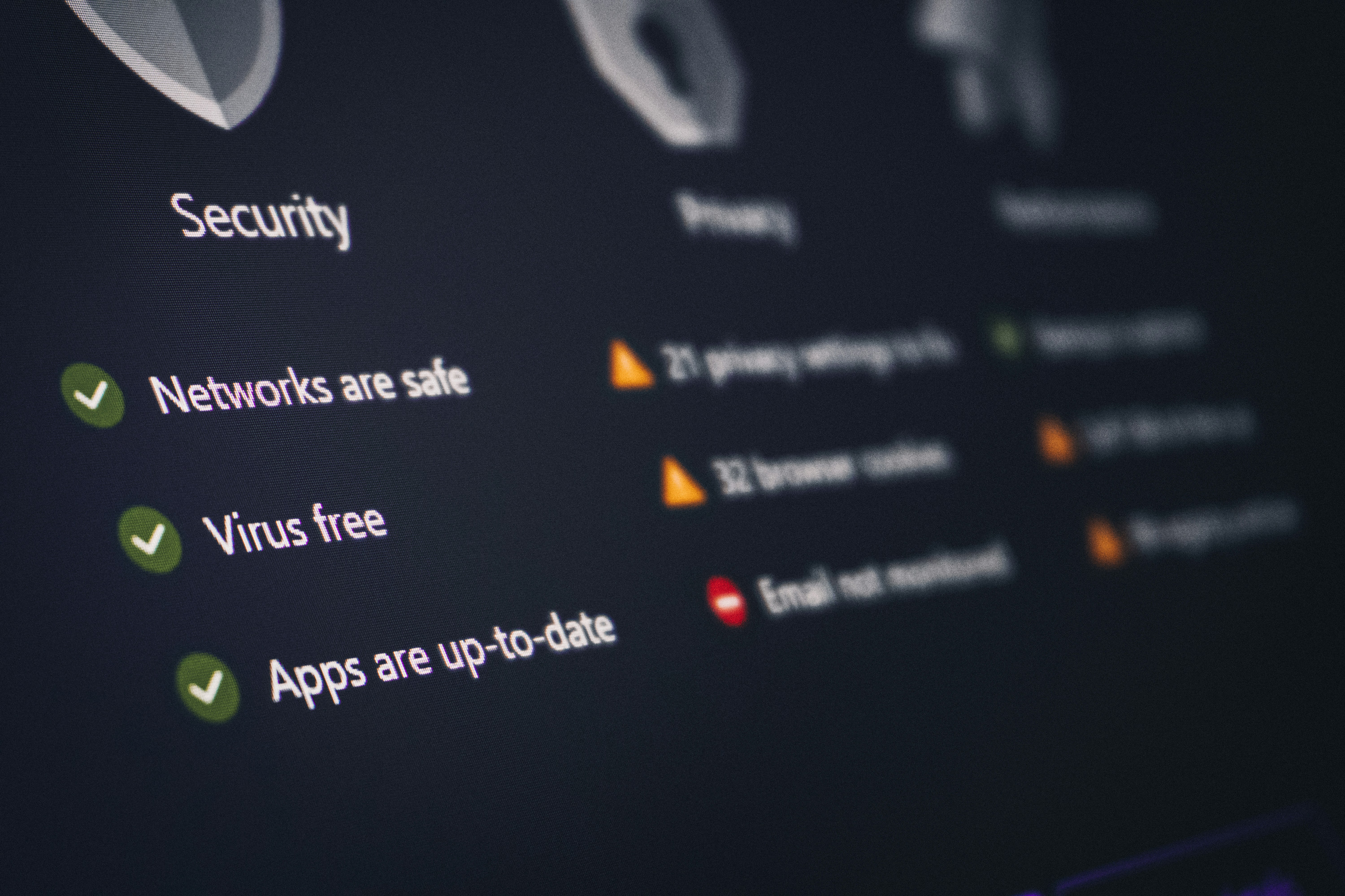 A security and privacy dashboard displaying protection status, representing the defensive cybersecurity tools enabled by AI