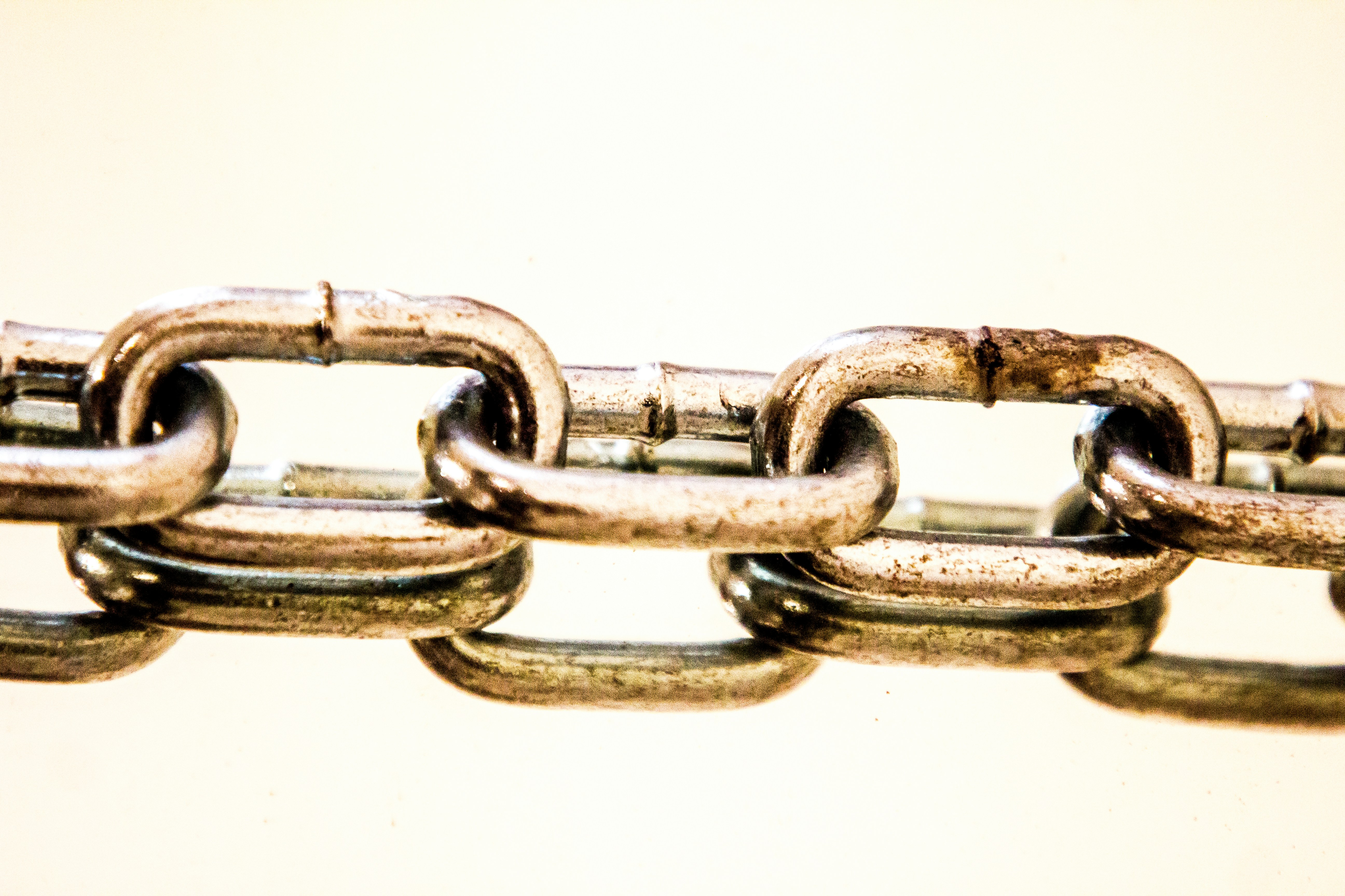 Metal chain links symbolizing the interconnected dependency chain in software supply chains